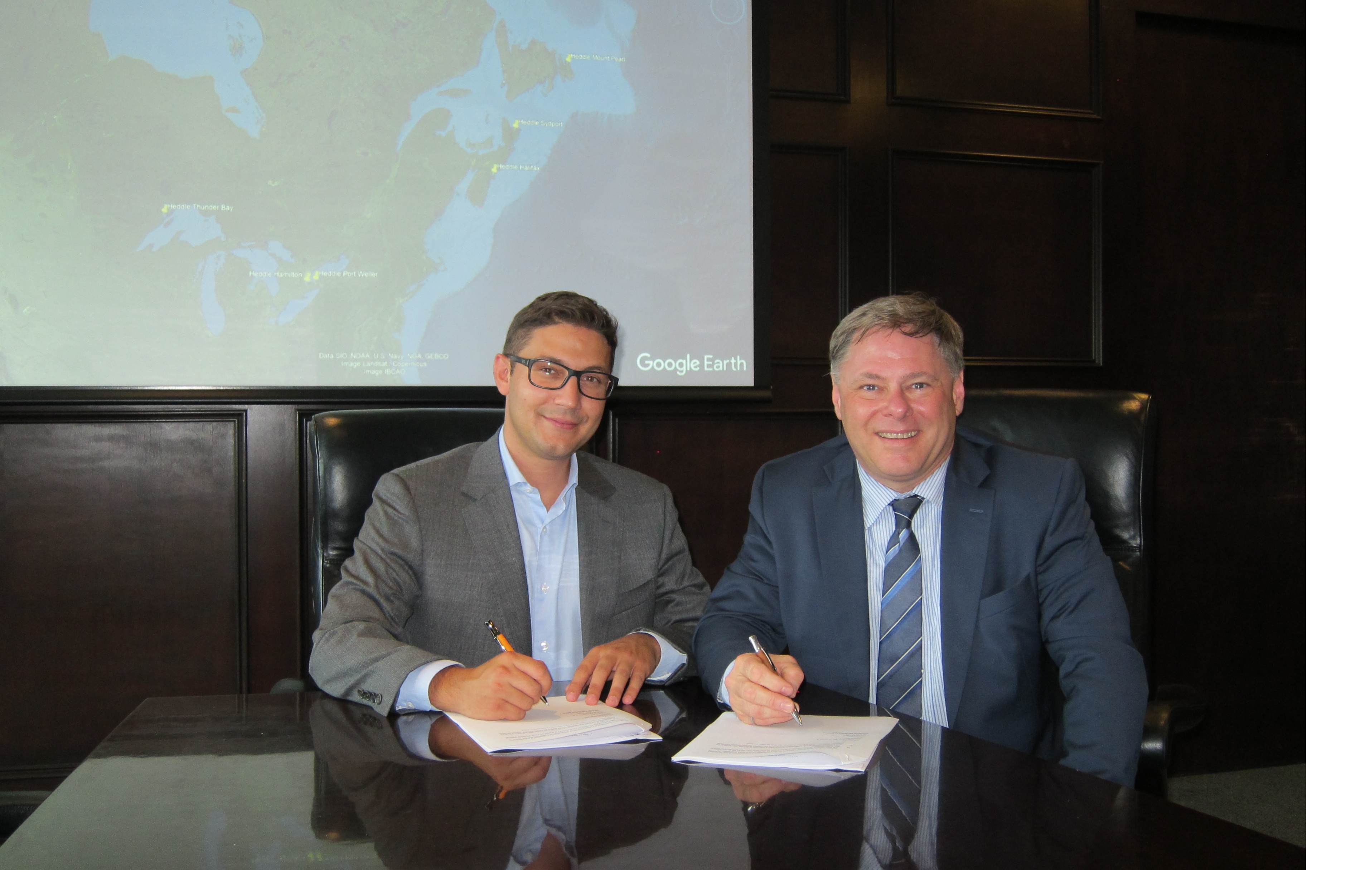 Shaun Padulo and Terry McGowan - signing agreement