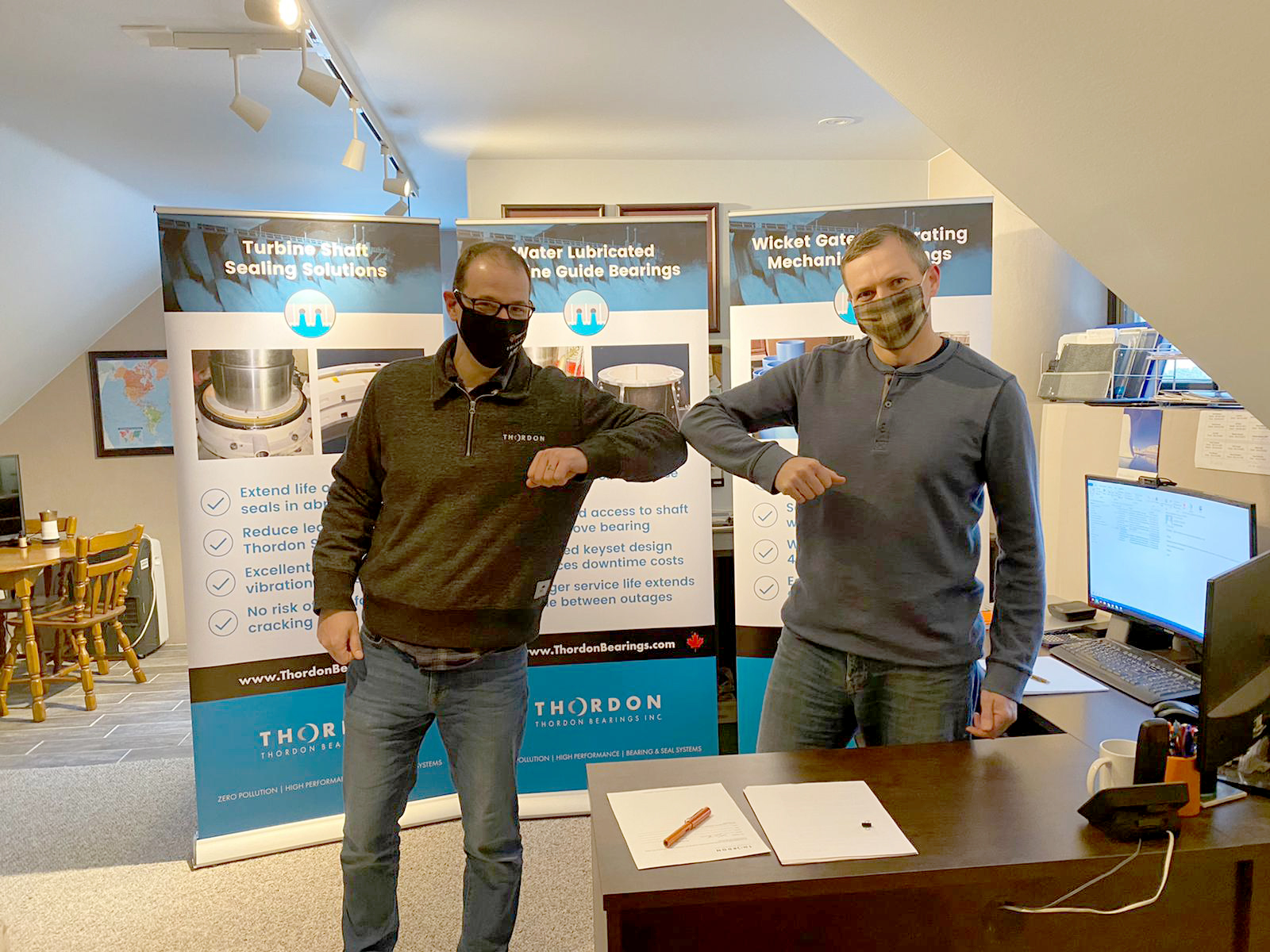 Scott Groves and Greg Auger after signing agreement